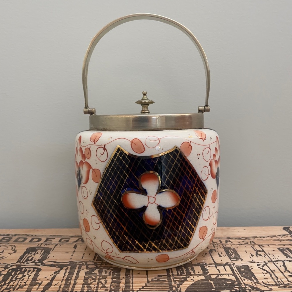 Floral Ceramic Jar with Metal Handle